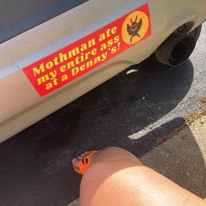 Mothman Ate My Ass At Denny's Sticker