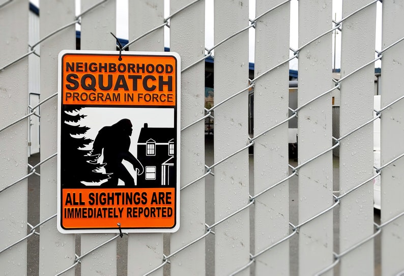 NEIGHBORHOOD SQUATCH Metal Sign