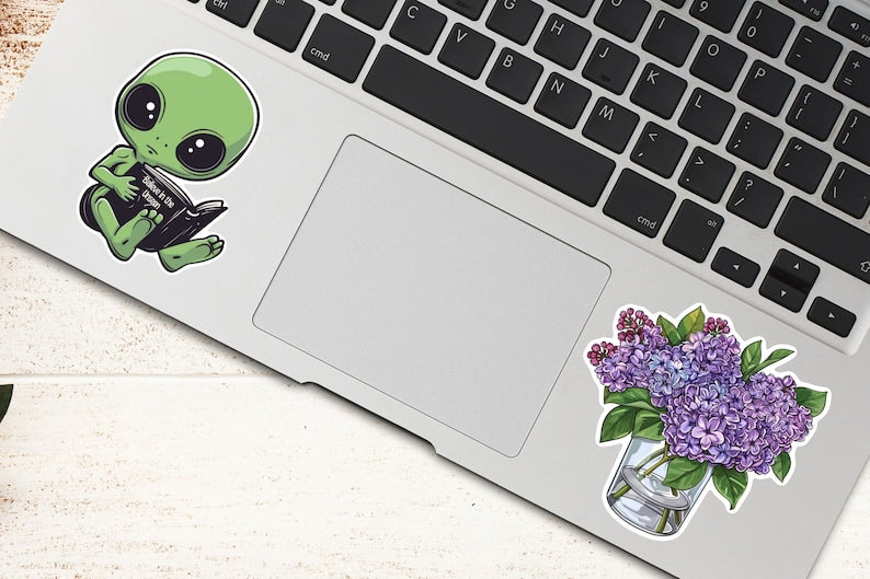 Adorable Green Alien Reading Sticker