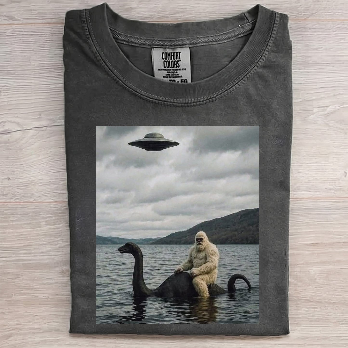 Bigfoot Rides Nessie – Legendary Lake Monster Shirt