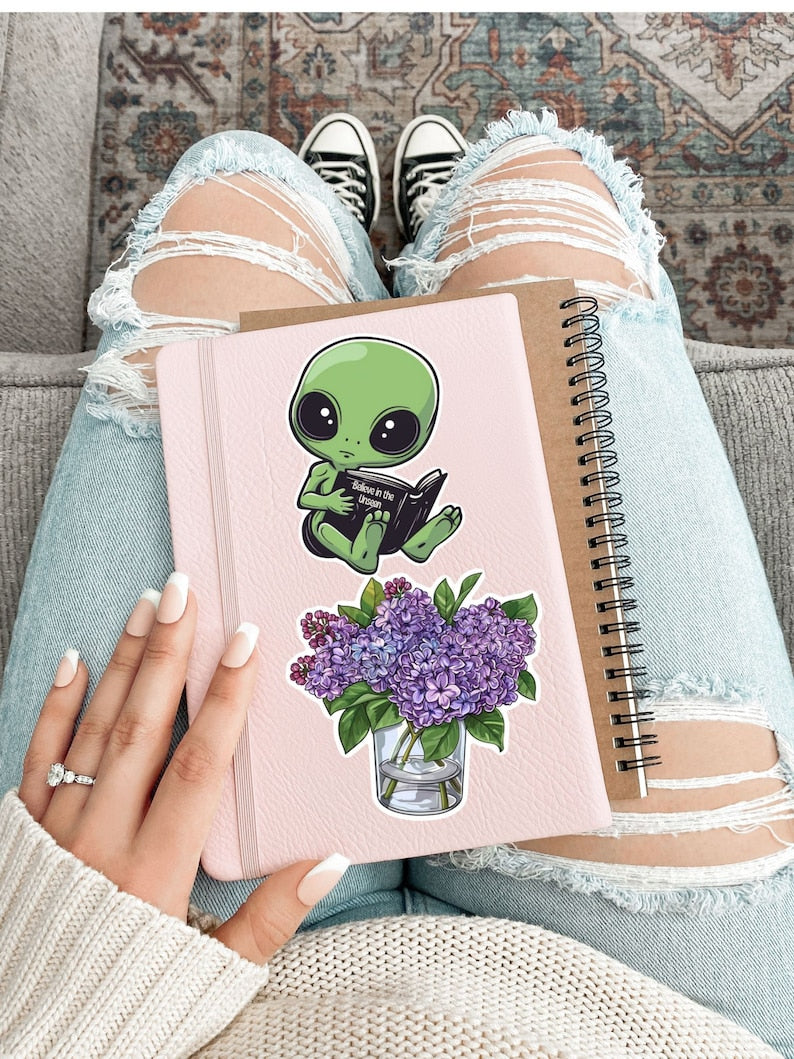 Adorable Green Alien Reading Sticker