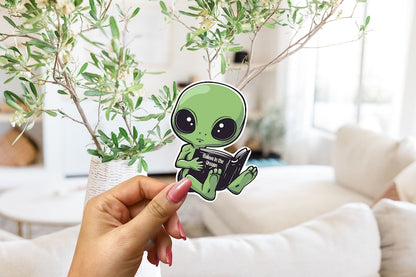 Adorable Green Alien Reading Sticker