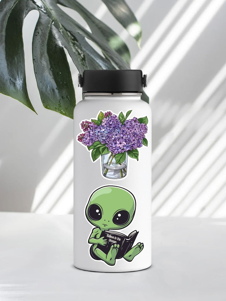 Adorable Green Alien Reading Sticker