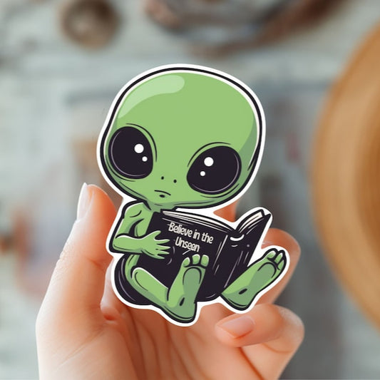 Adorable Green Alien Reading Sticker