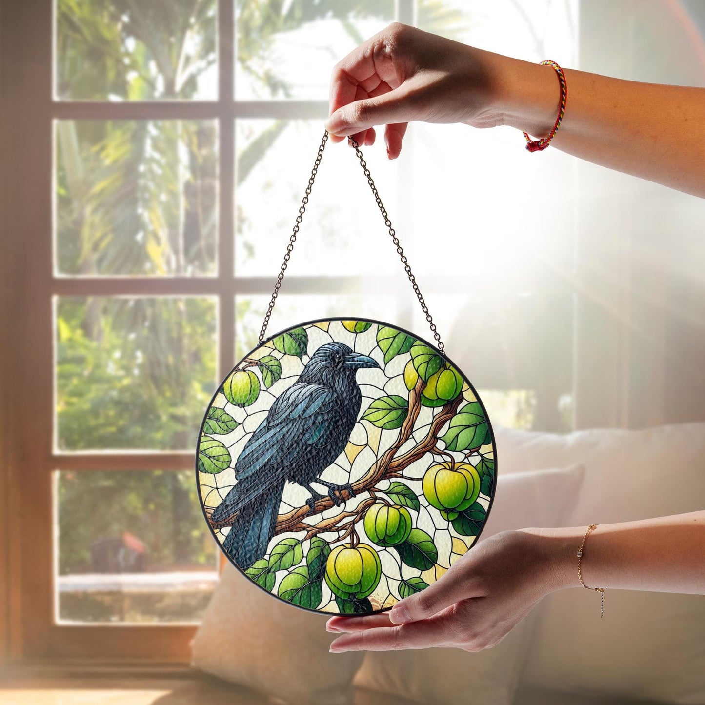 Raven Perch on the Malus Stained Glass Suncatcher