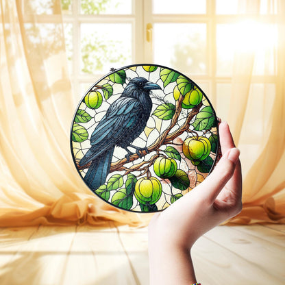 Raven Perch on the Malus Stained Glass Suncatcher